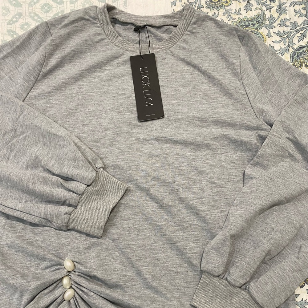 Adorable NWT long sleeve shirt by Lucky Lisa size large.  Light gray color.
